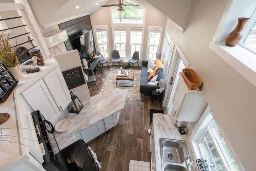 an overhead view of a kitchen and living room in a tiny house at Pet friendly Tiny House Rental with new Access to Guadalupe River NBTX in New Braunfels