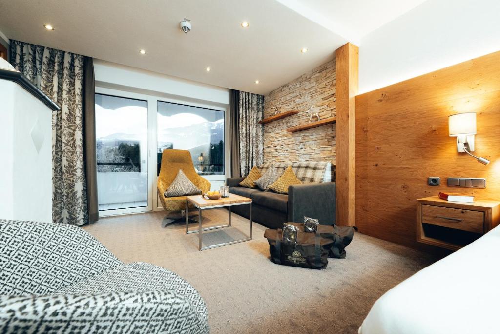 Posezení v ubytování Parkhotel Burgmühle