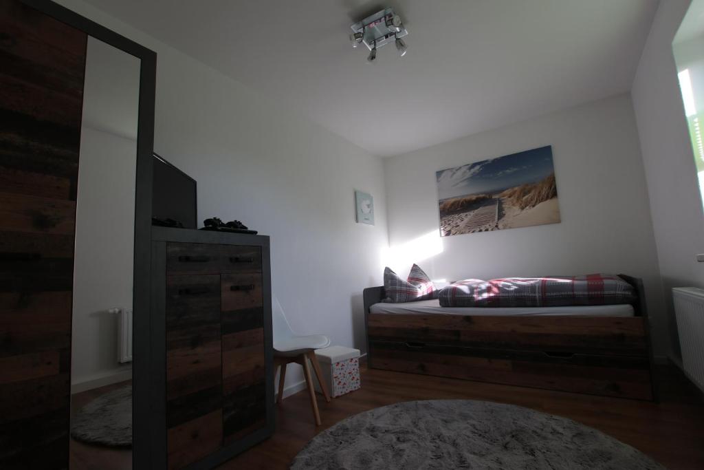 Postel nebo postele na pokoji v ubytování Ferienwohnung am Bärenstein