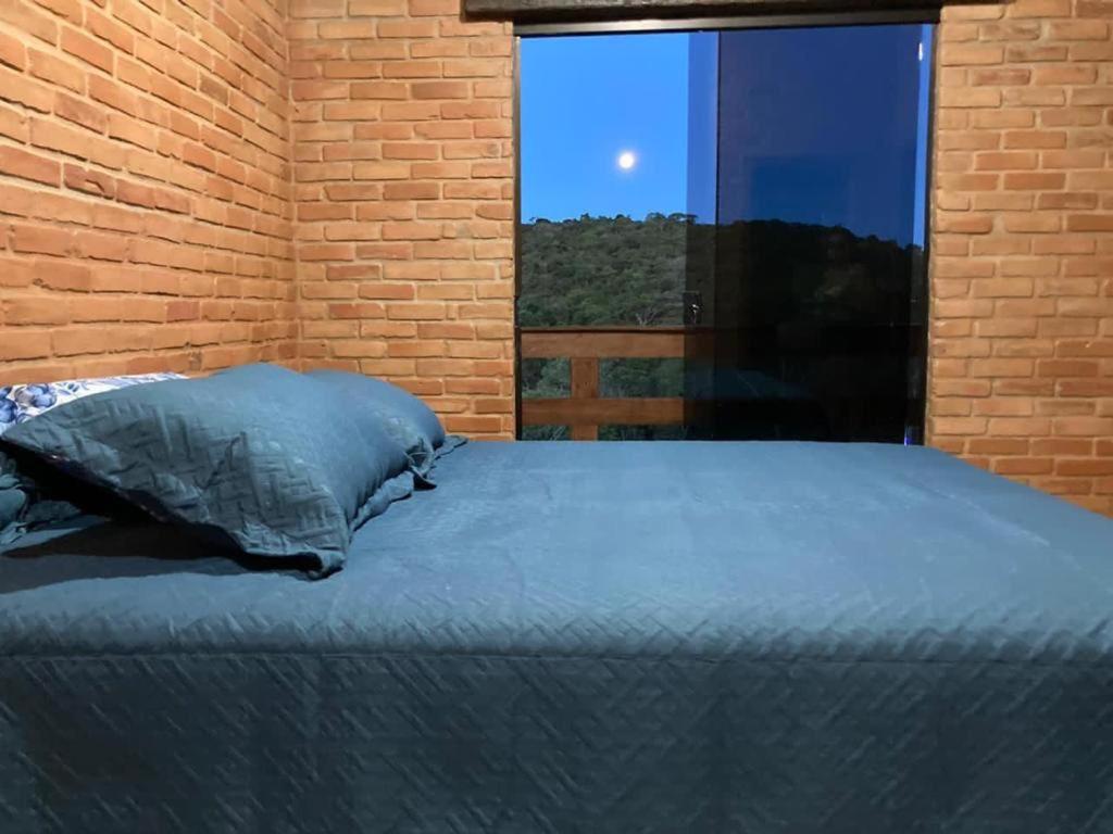 Ein Bett oder Betten in einem Zimmer der Unterkunft Casa do bosque