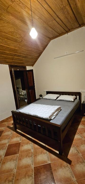 Postel nebo postele na pokoji v ubytování Moksha The blissful escape