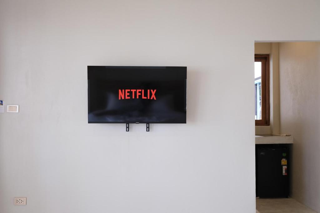 TV a/nebo společenská místnost v ubytování Nymph Hideout