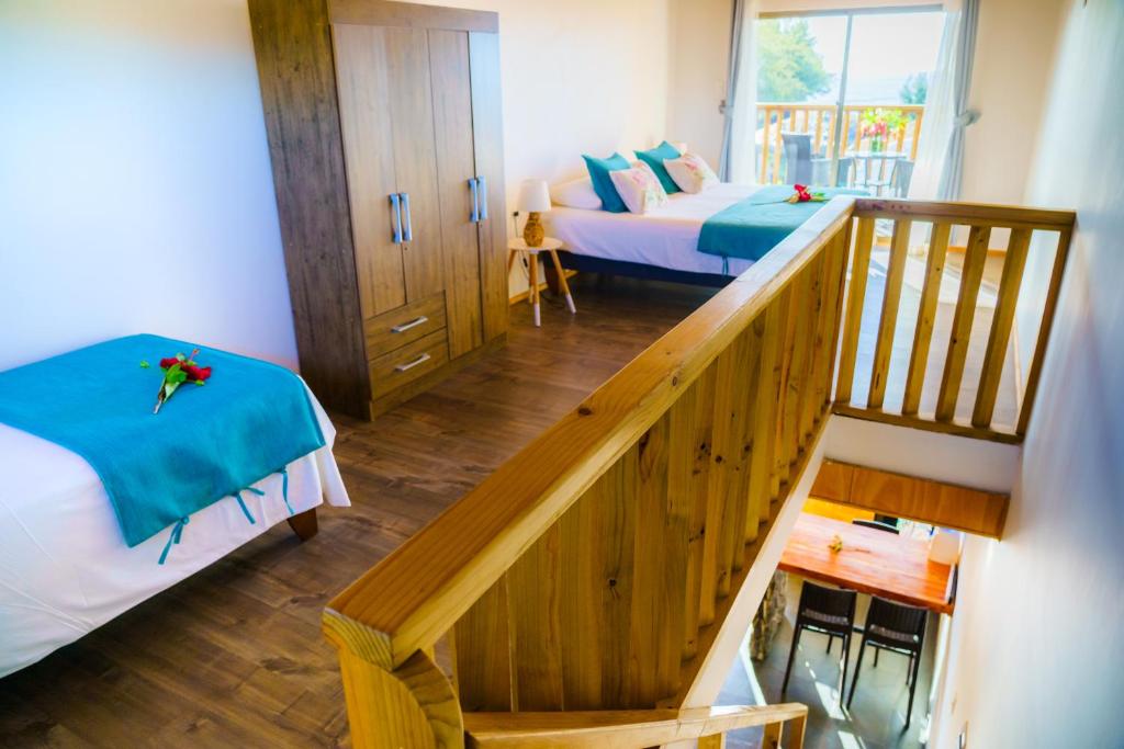 Postel nebo postele na pokoji v ubytování Matariki Sunset Apart Hotel
