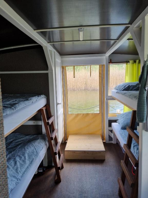 Postel nebo postele na pokoji v ubytování Floss Priepert 1