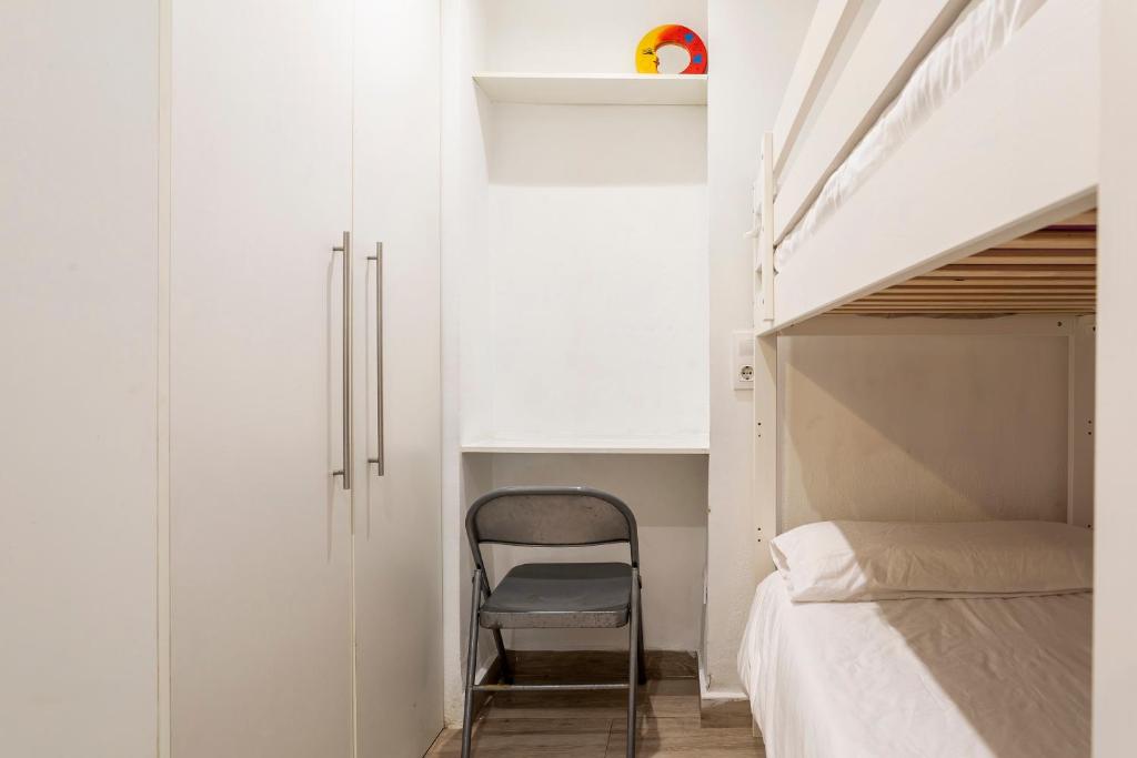 A bed or beds in a room at APARTAMENTO DE ENSUEÑO