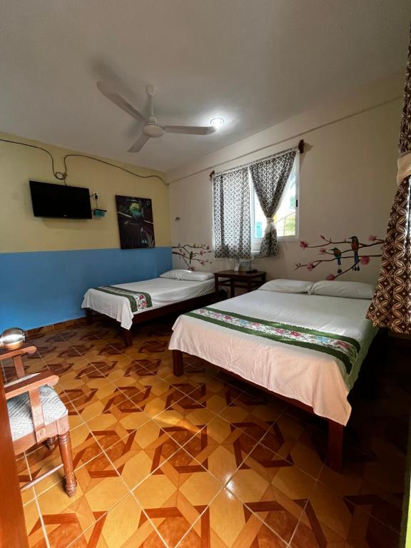 Postel nebo postele na pokoji v ubytování Casona del Negro Aguilar