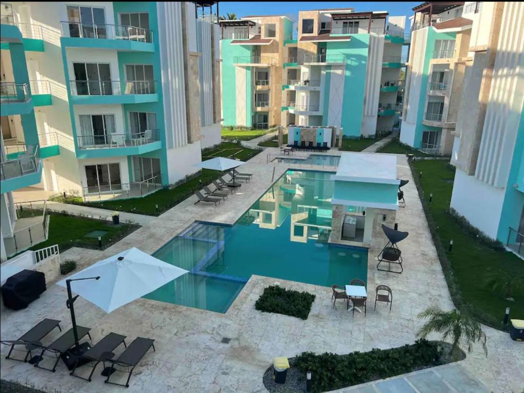 an overhead view of a swimming pool in a building at Maple Beach by DR Collection in Punta Cana