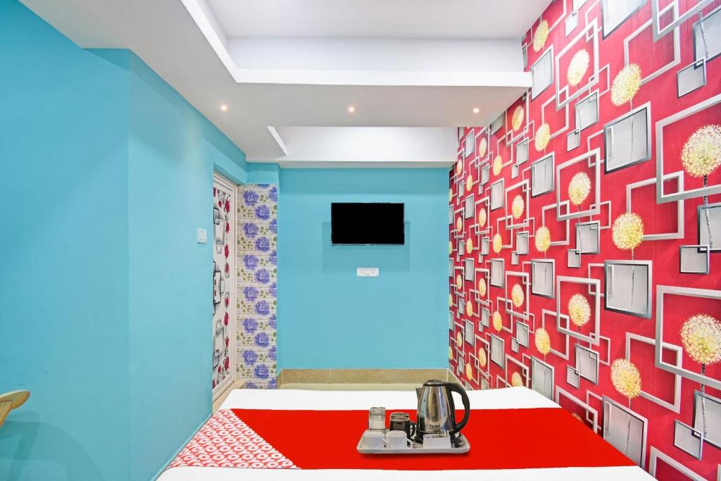 TV a/nebo společenská místnost v ubytování Hotel O Lewis Paradise