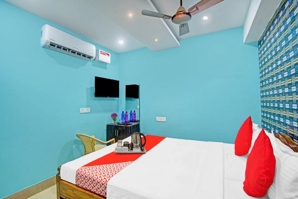 TV a/nebo společenská místnost v ubytování Hotel O Lewis Paradise