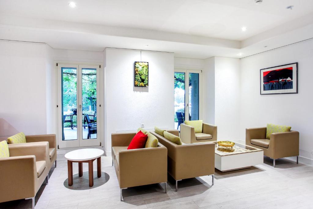 Posezení v ubytování Hotel La Longeraie