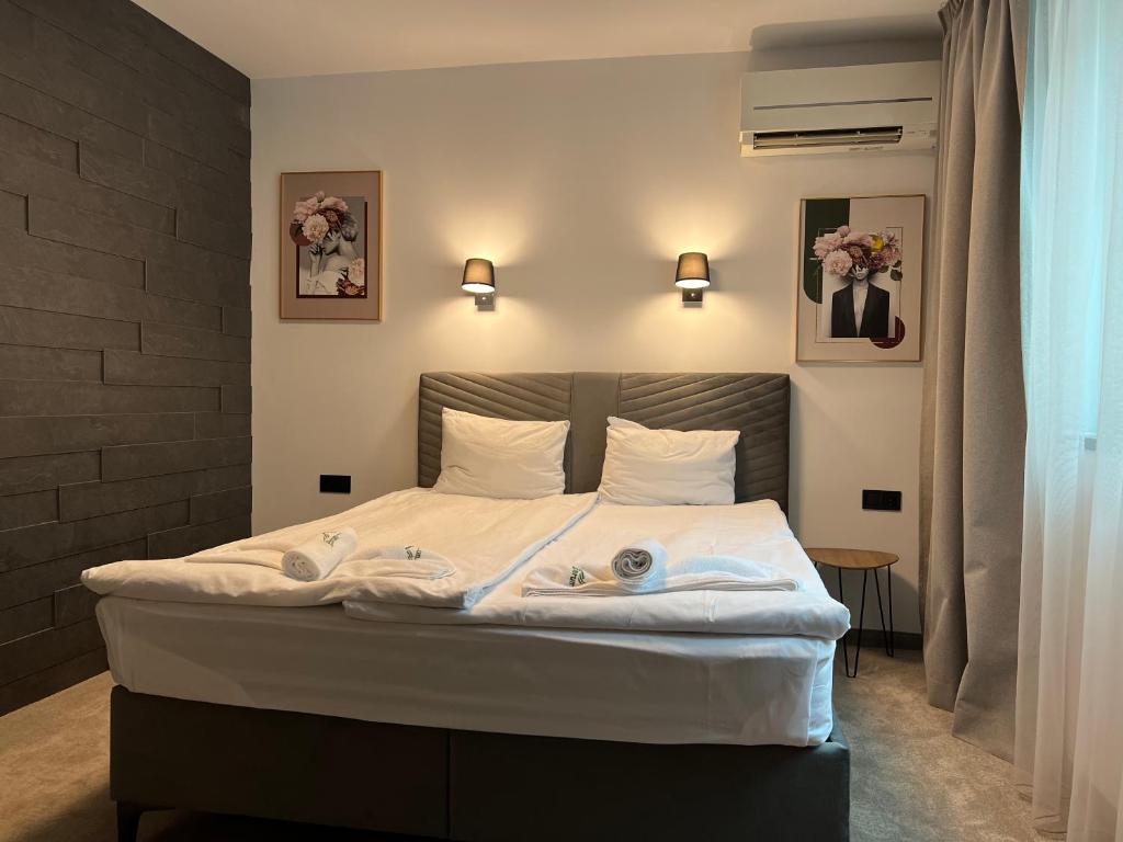 Postel nebo postele na pokoji v ubytování Perun Hotel Sandanski