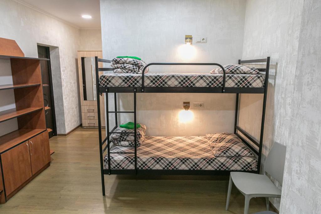 Postel nebo postele na pokoji v ubytování Alina Hotel & Hostel