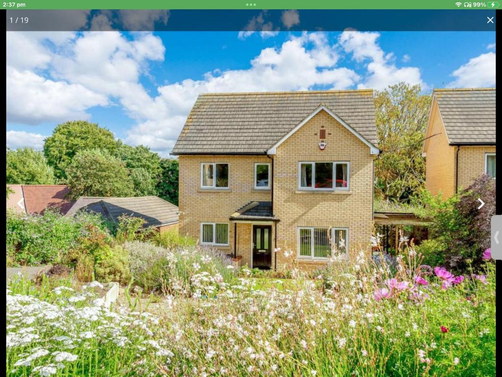 a house with a garden in front of it at Orchard House in Scarborough