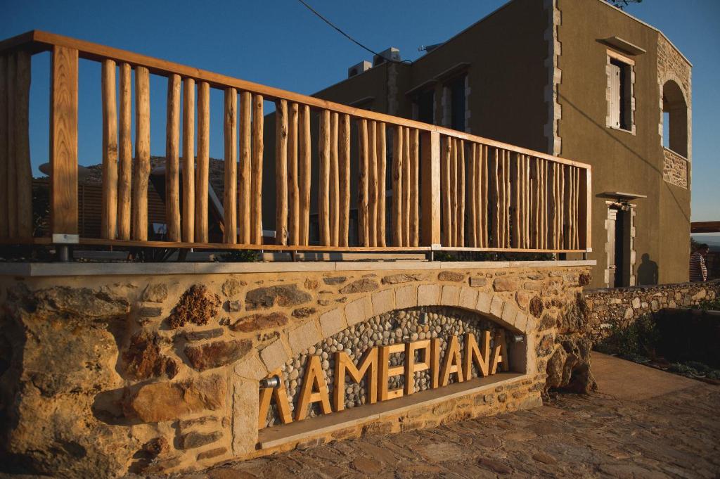 a stone wall with a sign that readsarmaarma at Lameriana Luxury Village in Lamerianá