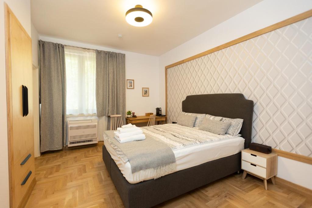 Ένα ή περισσότερα κρεβάτια σε δωμάτιο στο Luxury rooms 12-2
