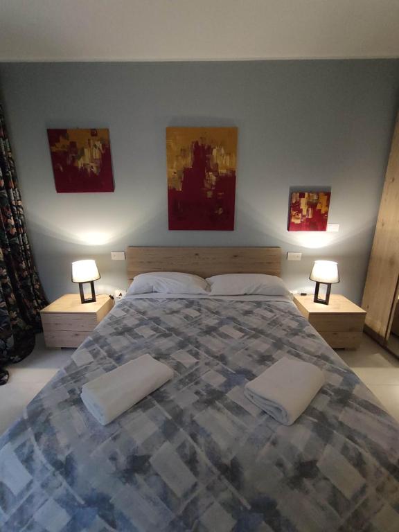 Postel nebo postele na pokoji v ubytování GArt Riviera B&B
