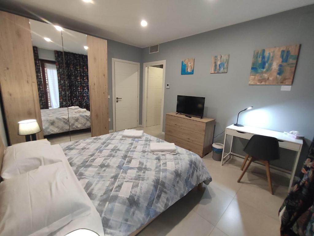 Postel nebo postele na pokoji v ubytování GArt Riviera B&B
