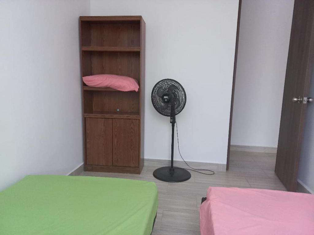 Postel nebo postele na pokoji v ubytování Apartamento en Ricaurte, Arrayanes de Peñaliza