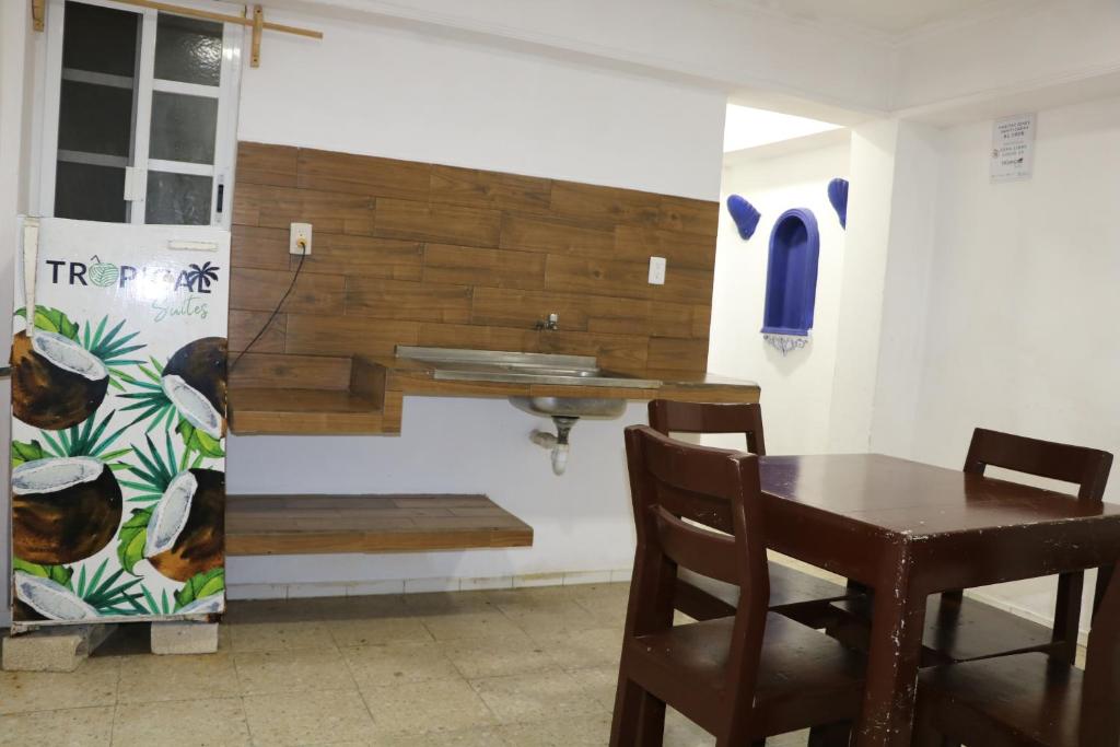 Postel nebo postele na pokoji v ubytování Hotel Tropical