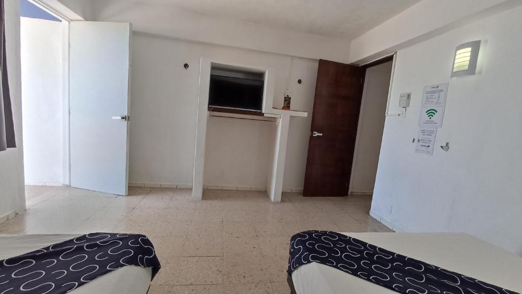 Kuchyň nebo kuchyňský kout v ubytování Hotel Tropical