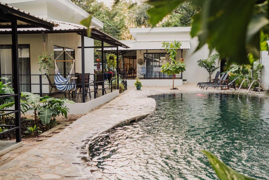 Bazén v ubytování EcoVillas Las Melinas nebo v jeho okolí