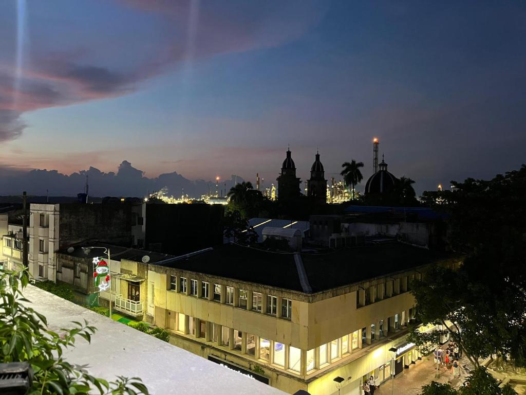 a view of a city at night at Hotel San Carlos in Barrancabermeja