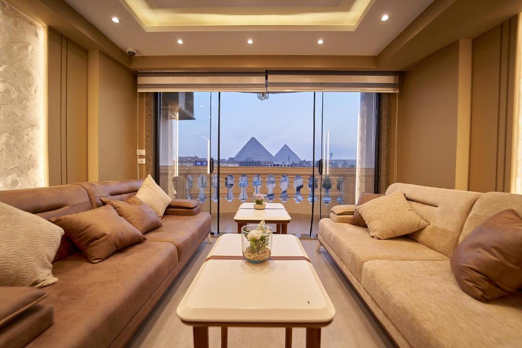 Posezení v ubytování Pyramids Charm Hotel