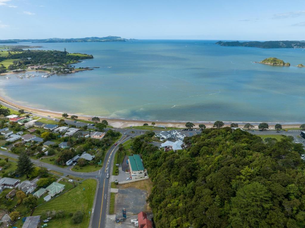 an aerial view of a town and a body of water at Bay of Islands Gateway Motel & Apartments in Paihia