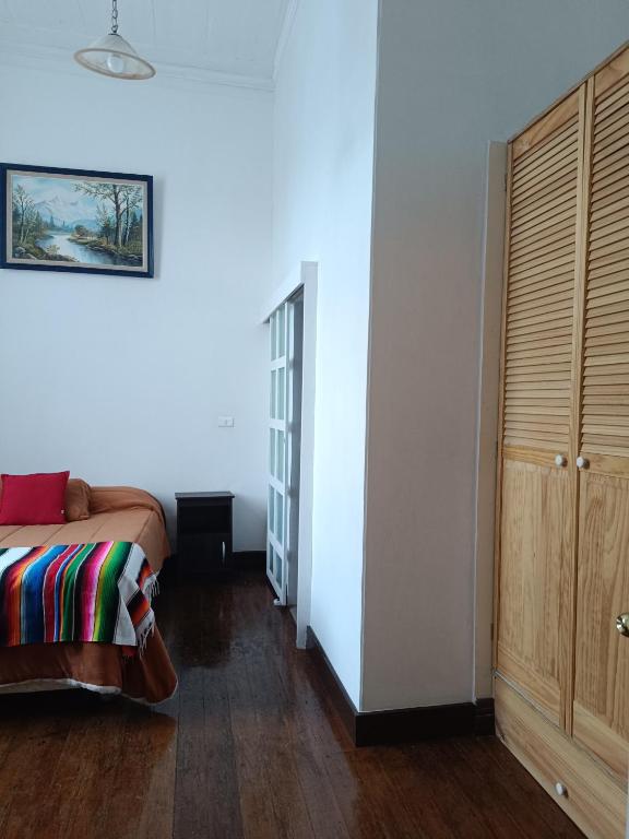 Postel nebo postele na pokoji v ubytování Hostal Tulio Porteño