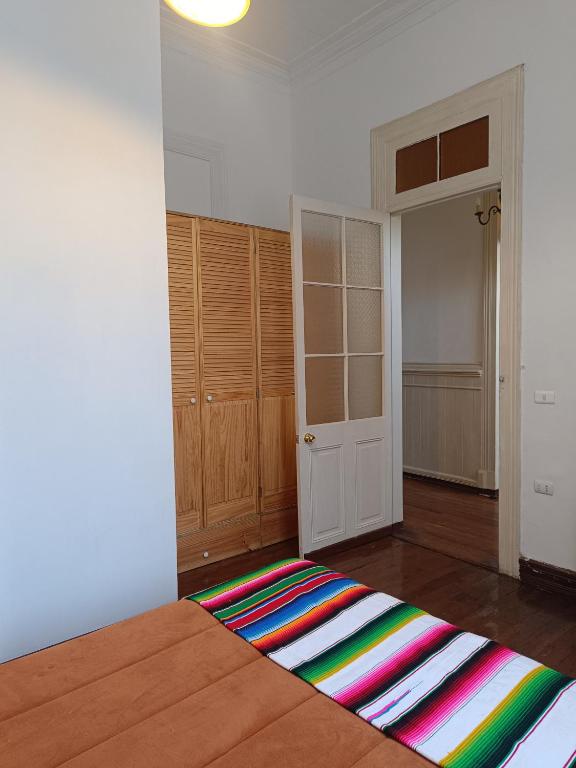 Postel nebo postele na pokoji v ubytování Hostal Tulio Porteño