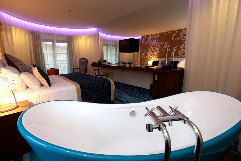 Kuchyň nebo kuchyňský kout v ubytování Hotel Cascade Resort & Spa