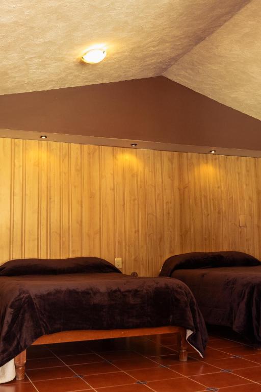 Postel nebo postele na pokoji v ubytování Hotel Real de San Antonio