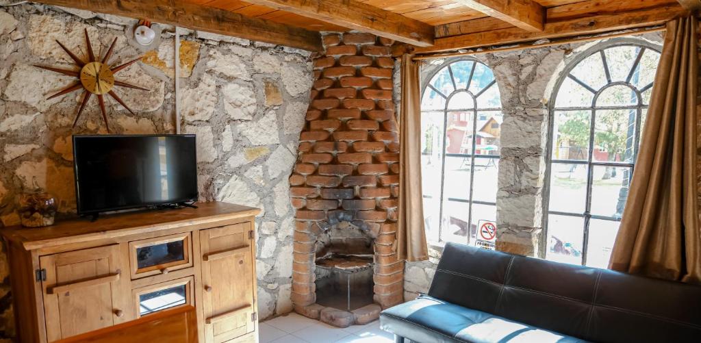 TV a/nebo společenská místnost v ubytování Hotel Real de San Antonio