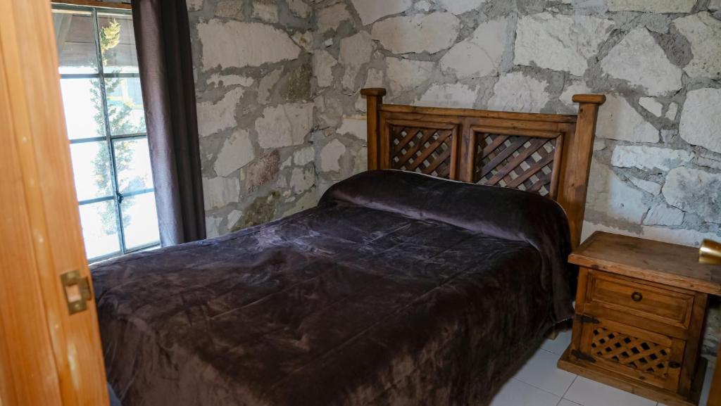 Postel nebo postele na pokoji v ubytování Hotel Real de San Antonio