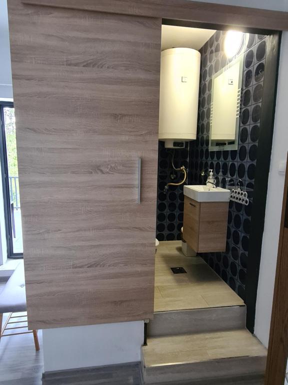Koupelna v ubytování Sipos Vendég és Apartmanház
