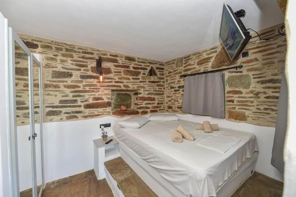 Postel nebo postele na pokoji v ubytování Zannis kelè Zannel seaside serenity