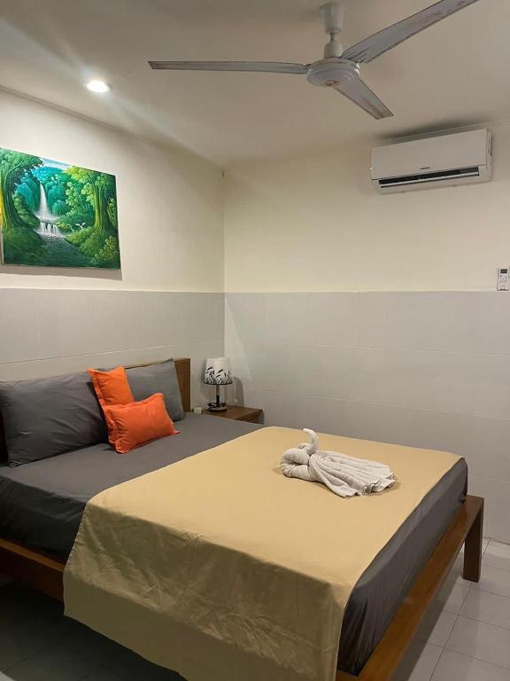 Postel nebo postele na pokoji v ubytování Lita Homestay