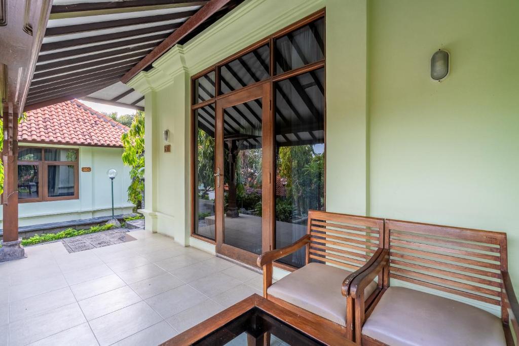 Patio nebo venkovní prostory v ubytování Taman Surgawi Resort & Spa