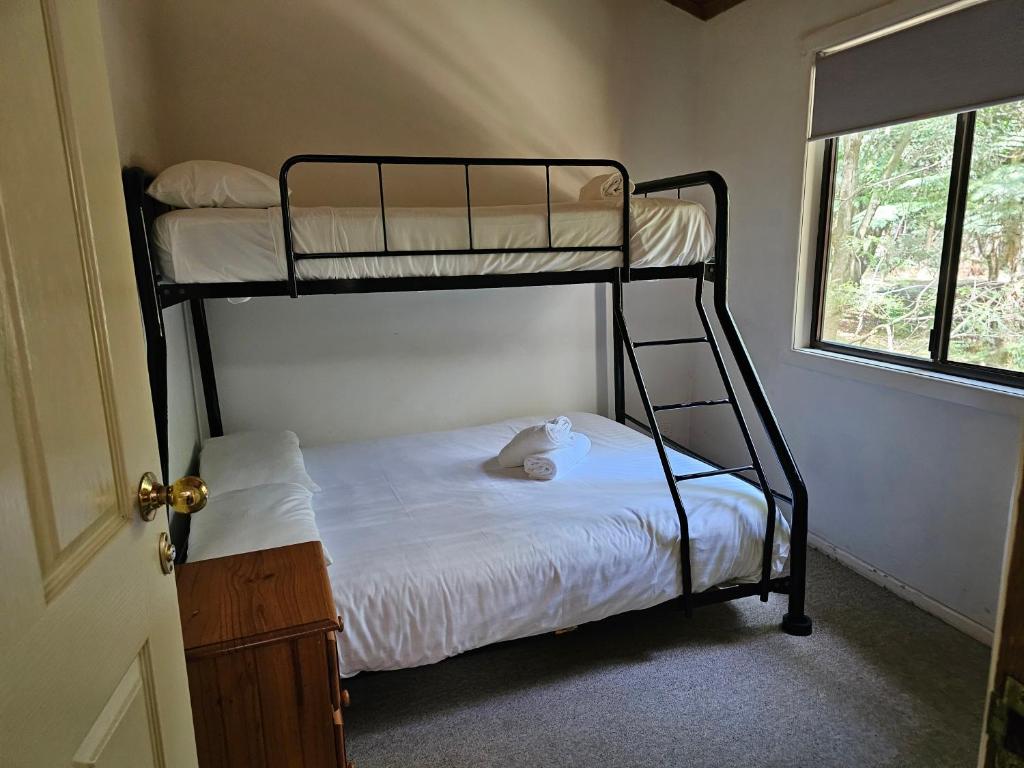 Postel nebo postele na pokoji v ubytování Wanderers Retreat