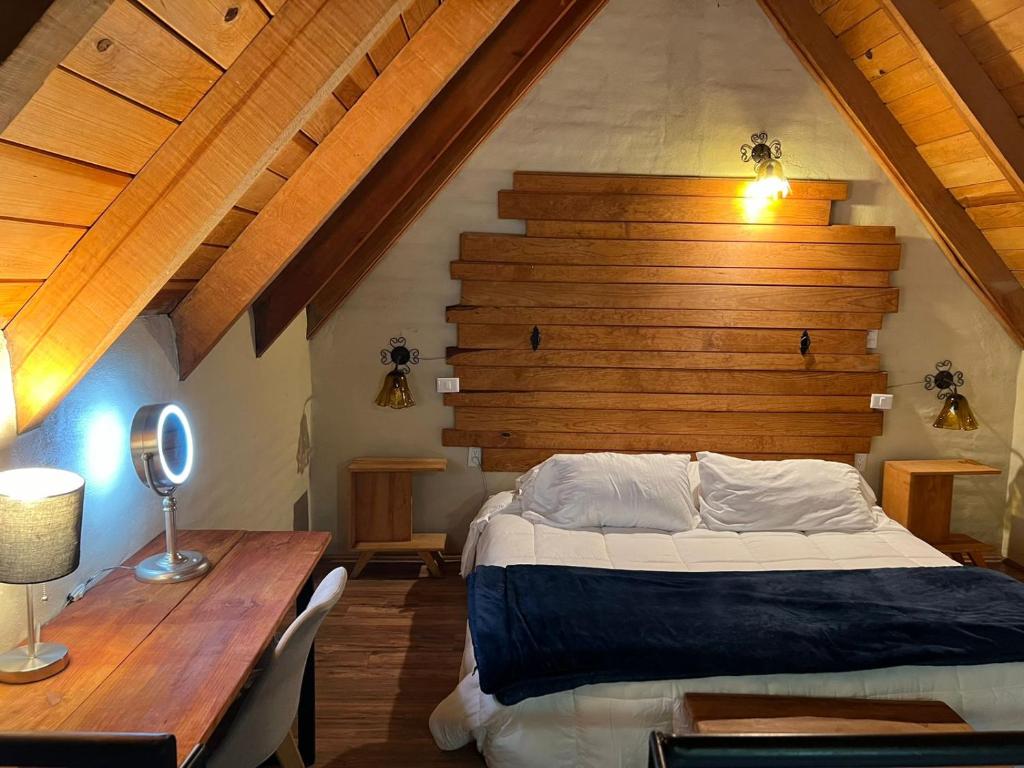 Postel nebo postele na pokoji v ubytování CABAÑAS SAN MATEO en mazamitla