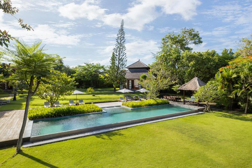 an image of a swimming pool at a resort at Villa Amita by Nakula in Kerobokan