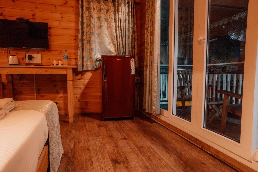 Kuchyň nebo kuchyňský kout v ubytování Obrigado Cottages