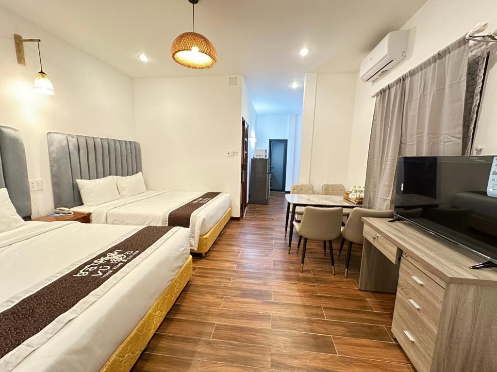 Postel nebo postele na pokoji v ubytování BA TAM VU SUA Homestay
