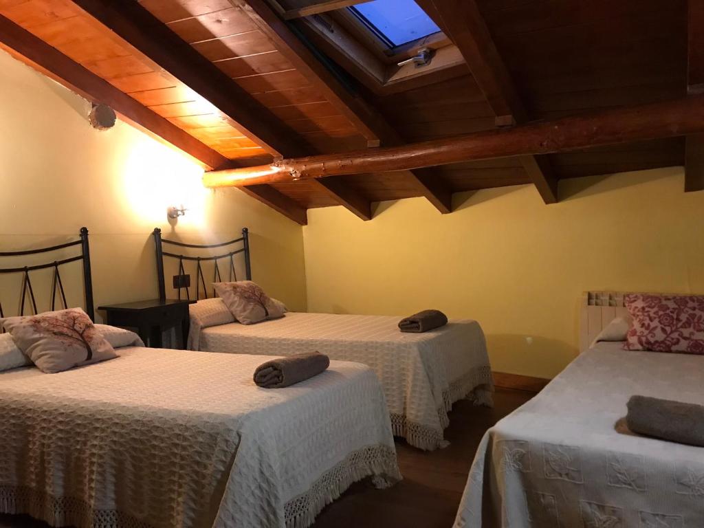 Postel nebo postele na pokoji v ubytování Casa Rural EL RINCÓN DE LA MORAÑA