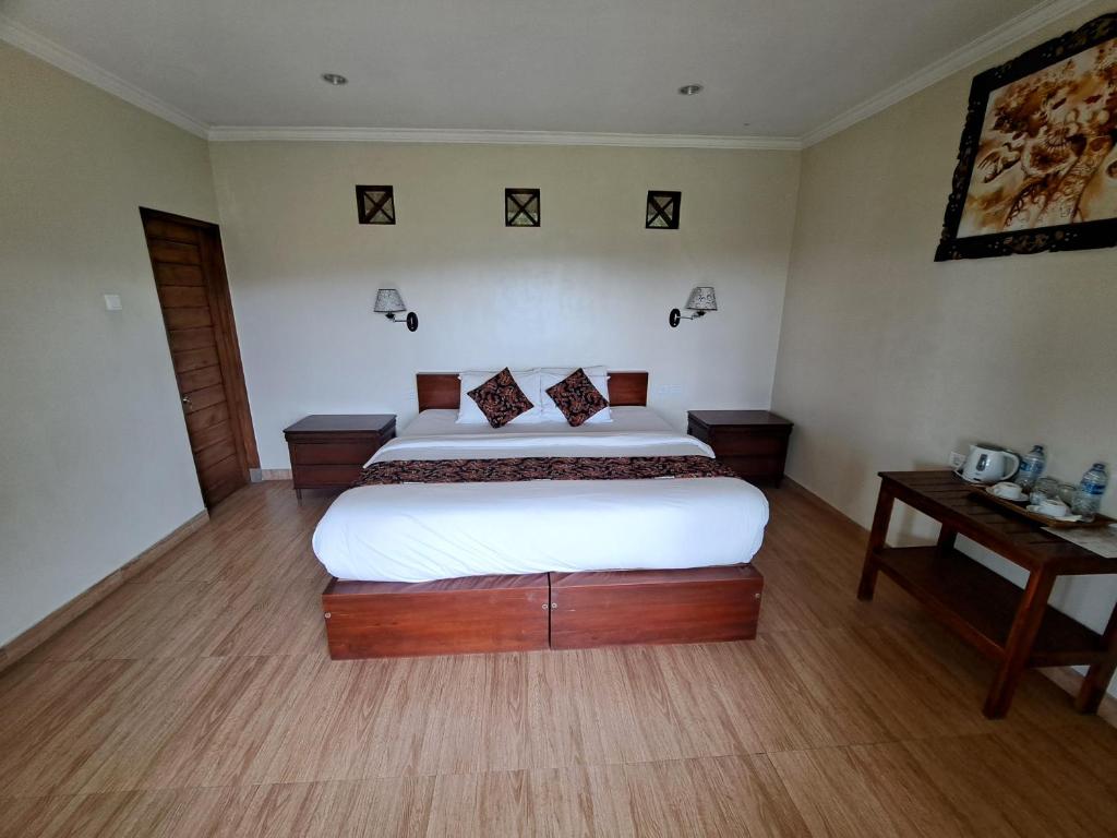 Voodi või voodid majutusasutuse Bali Rahayu Homestay toas