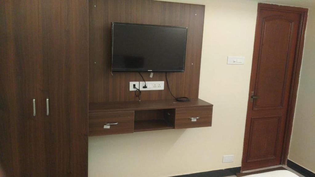TV a/nebo společenská místnost v ubytování A.R Residency