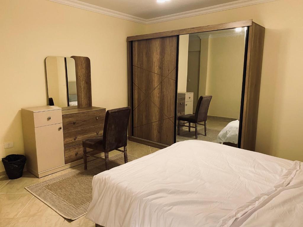 Postel nebo postele na pokoji v ubytování Cozy 2 BR in New Cairo City - Gated Compound