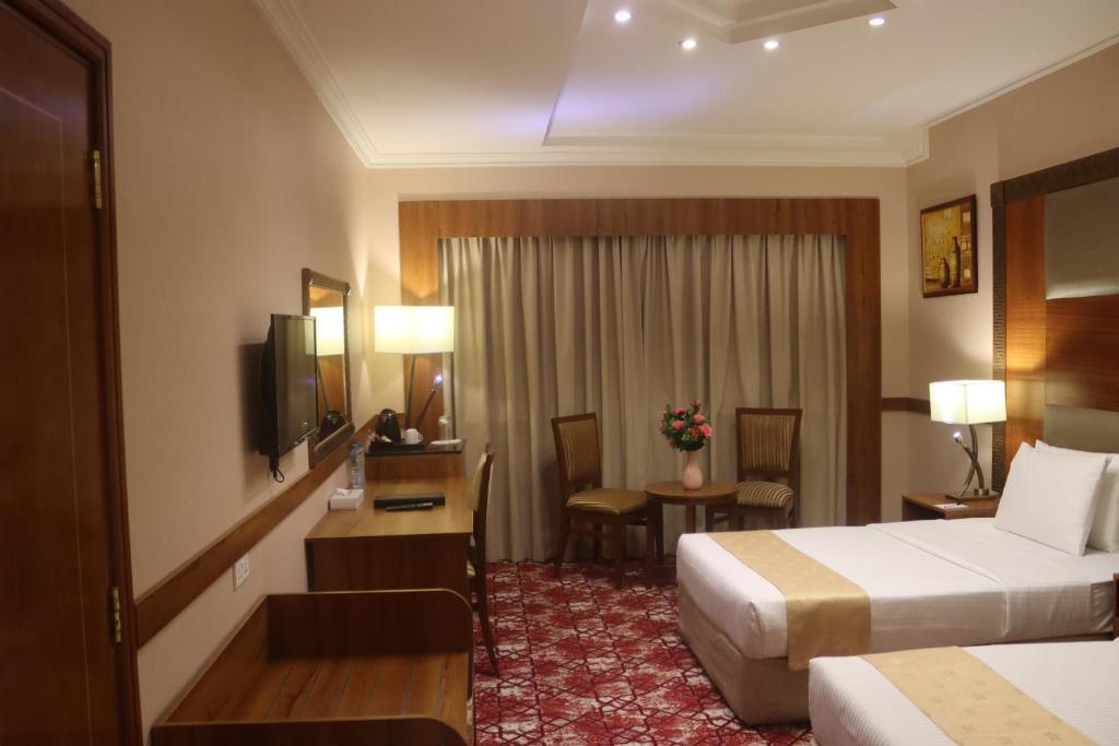 TV a/nebo společenská místnost v ubytování GSS Avenue Hotel Ex Delmon Hotel