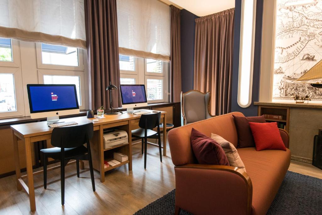 TV a/nebo společenská místnost v ubytování Hotel Stella Maris