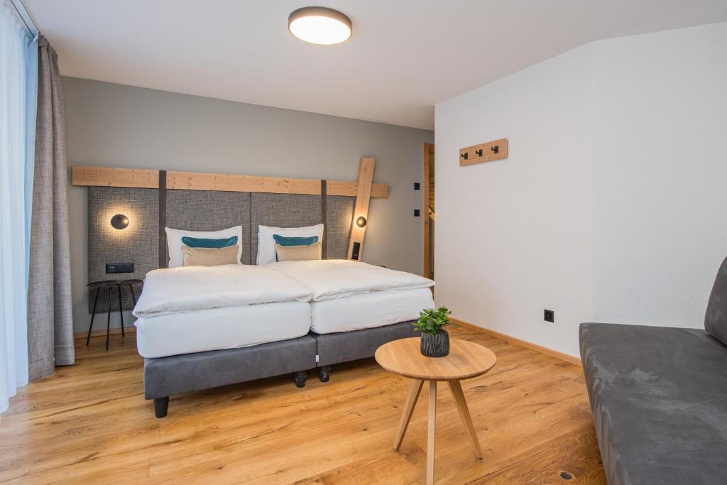 Postel nebo postele na pokoji v ubytování Arctis - Wohnung Lea